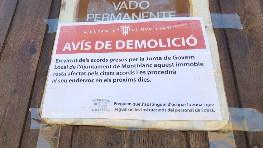 Cartell de l' "avís de demolició"